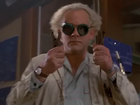 Animated GIF of Doc Brown from "Back to the Future" holding electric cables and saying "Ready!"